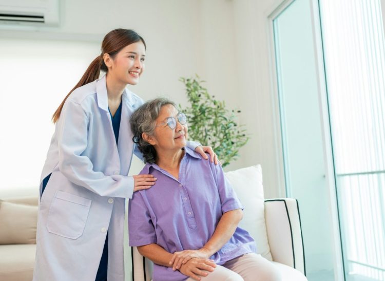 female-doctor-taking-care-and-talking-mature-female-patient-3.jpg