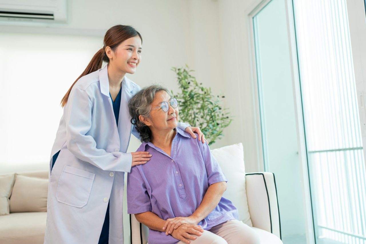 female-doctor-taking-care-and-talking-mature-female-patient-3.jpg